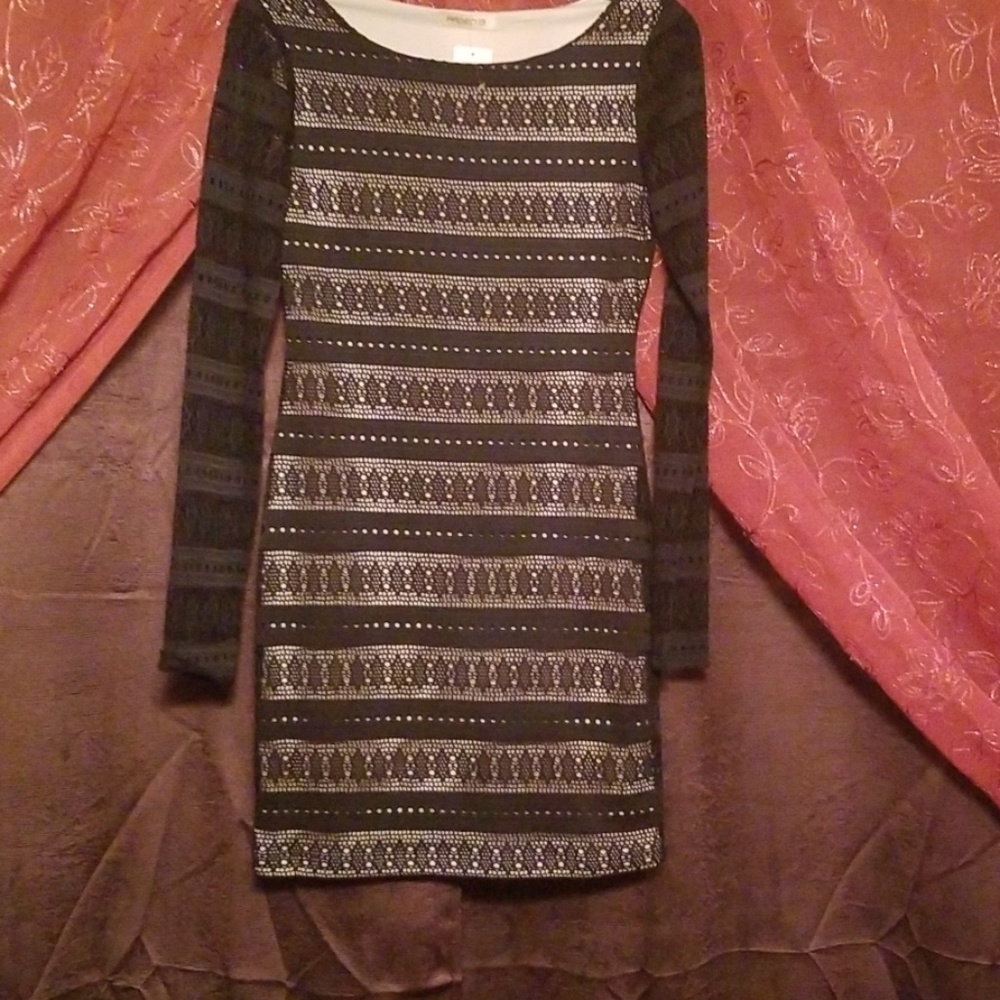 Black dress with nude lining.